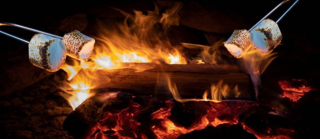 Marshmallows,Roasting,In,A,Night,Campfire,For marshmallows roasting at Chestnut Ridge Campground in a night campfire for smores.